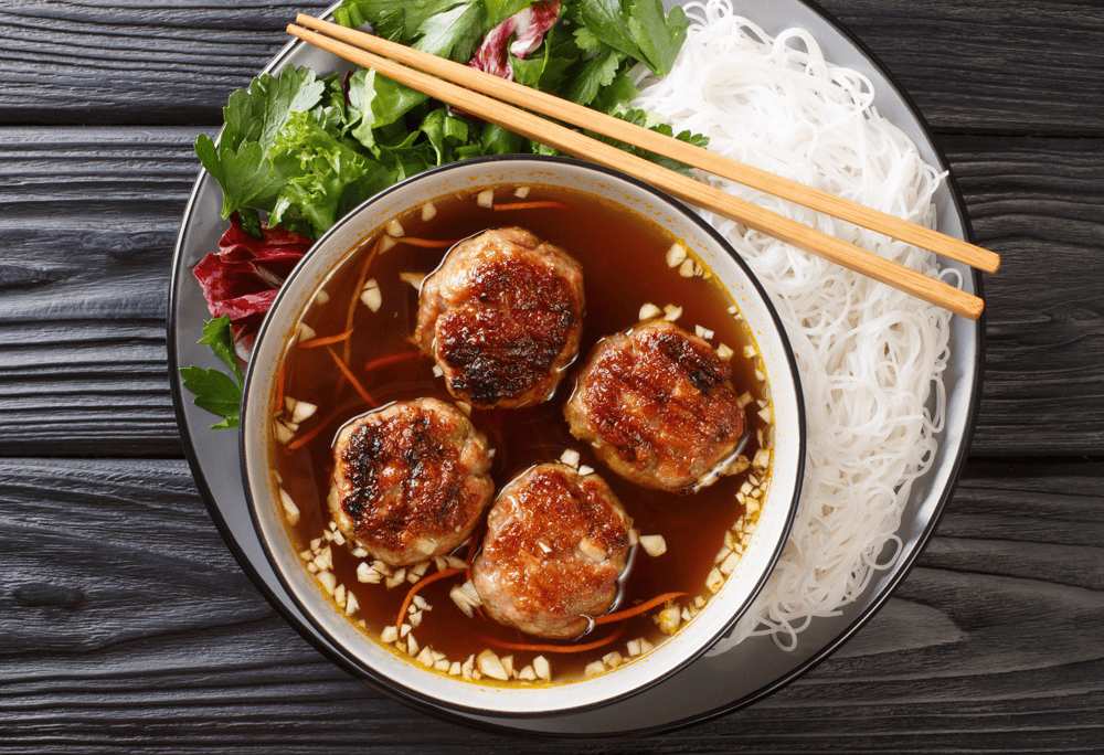 The captivating history of Bun Cha Hanoi dates back to the streets of Hanoi, where it has been a cherished dish for generations (Source: Canva)