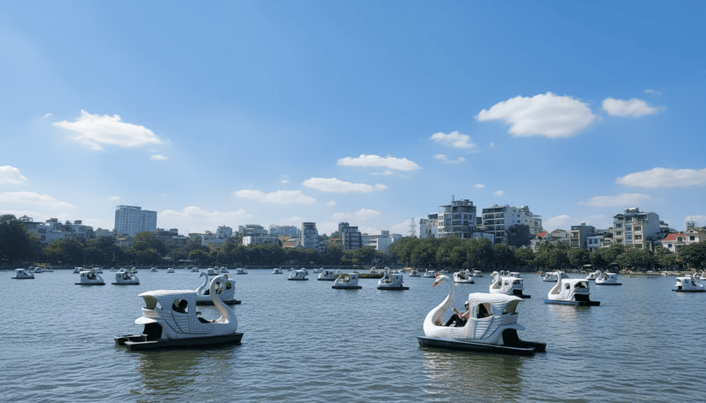 Pedaling on Truc Bach Lake is a pleasure for visitors of all ages