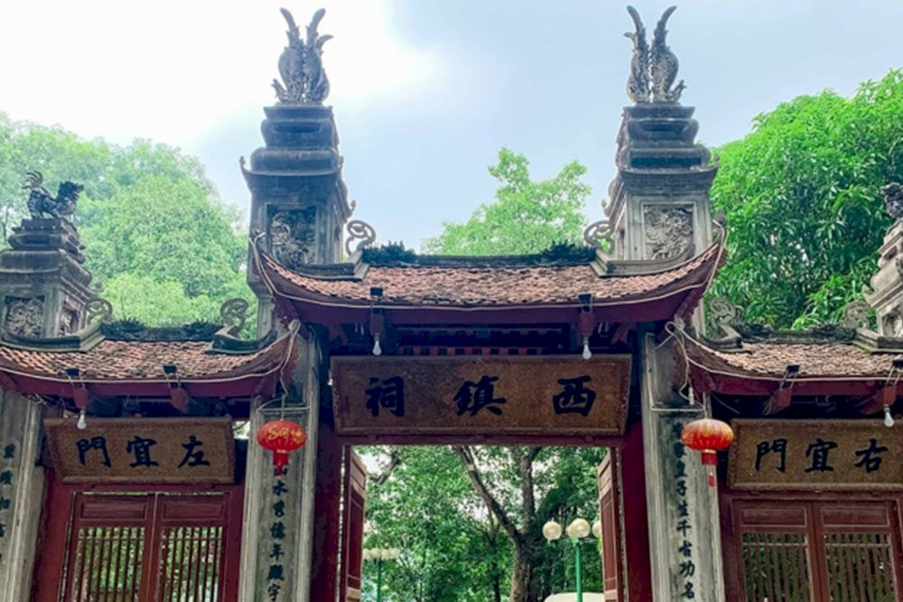 The temple roof follows the traditional style of ancient Vietnamese temples