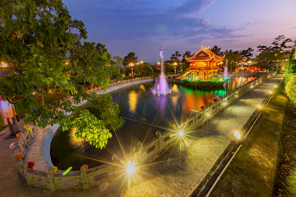 The One Pillar Pagoda stands majestically in the middle of the Crescent Lake