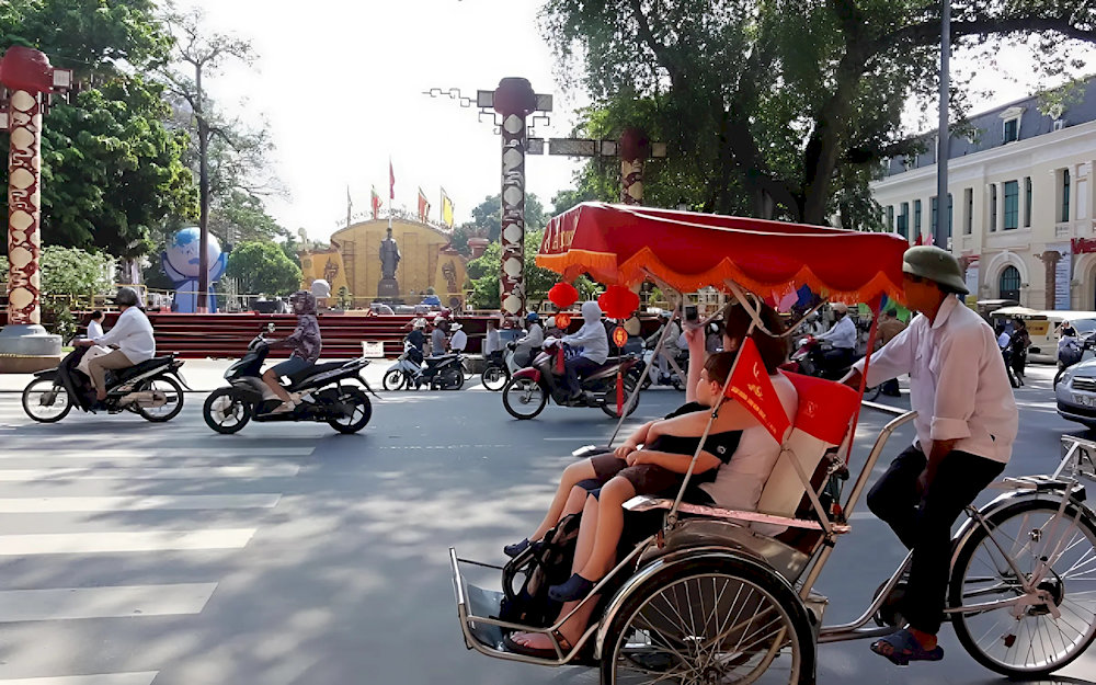 Cyclo are easily spotted around Hanoi Old Quarter