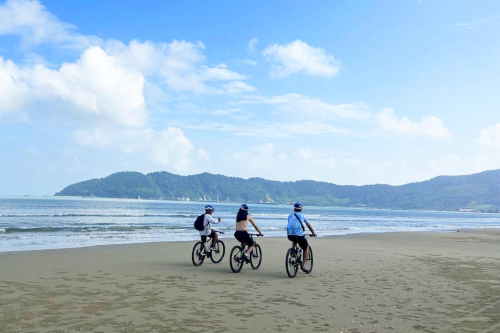 Cycling from Hoi An Ancient Town to An Bang Beach is a budget-friendly and interesting option