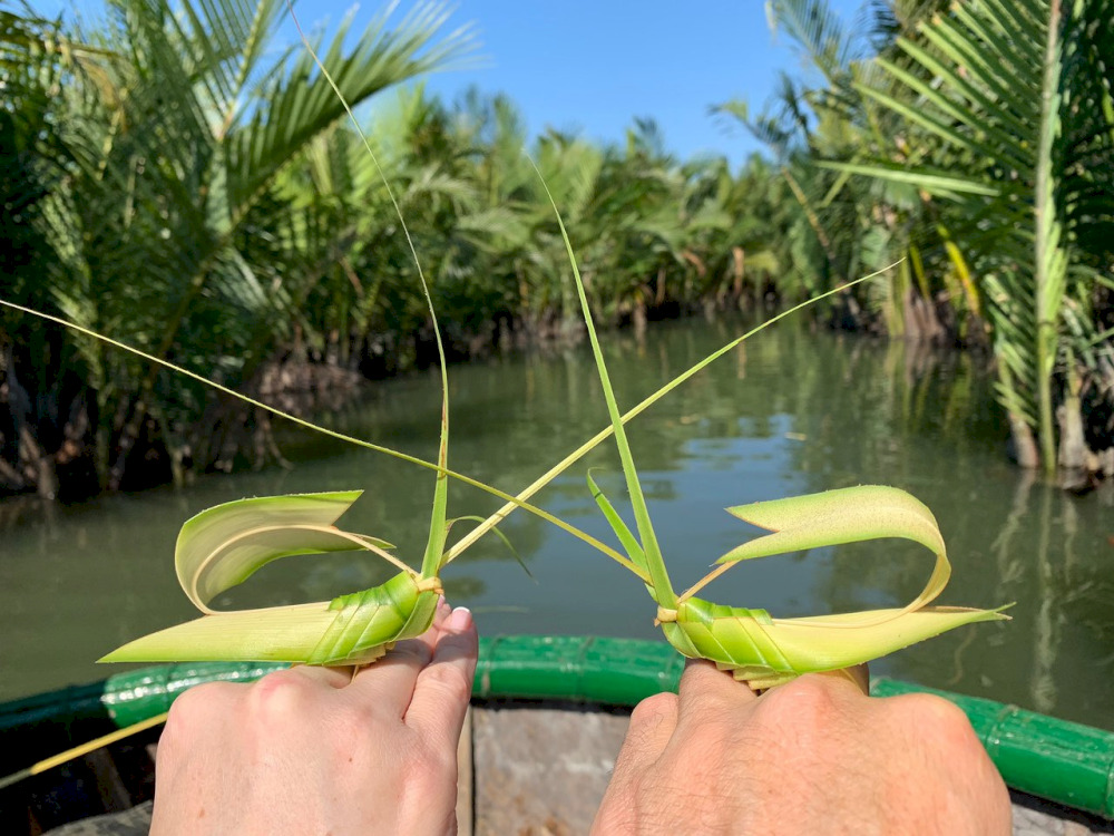 Immerse yourself in local culture by learning how to weave intricate handicrafts from coconut leaves